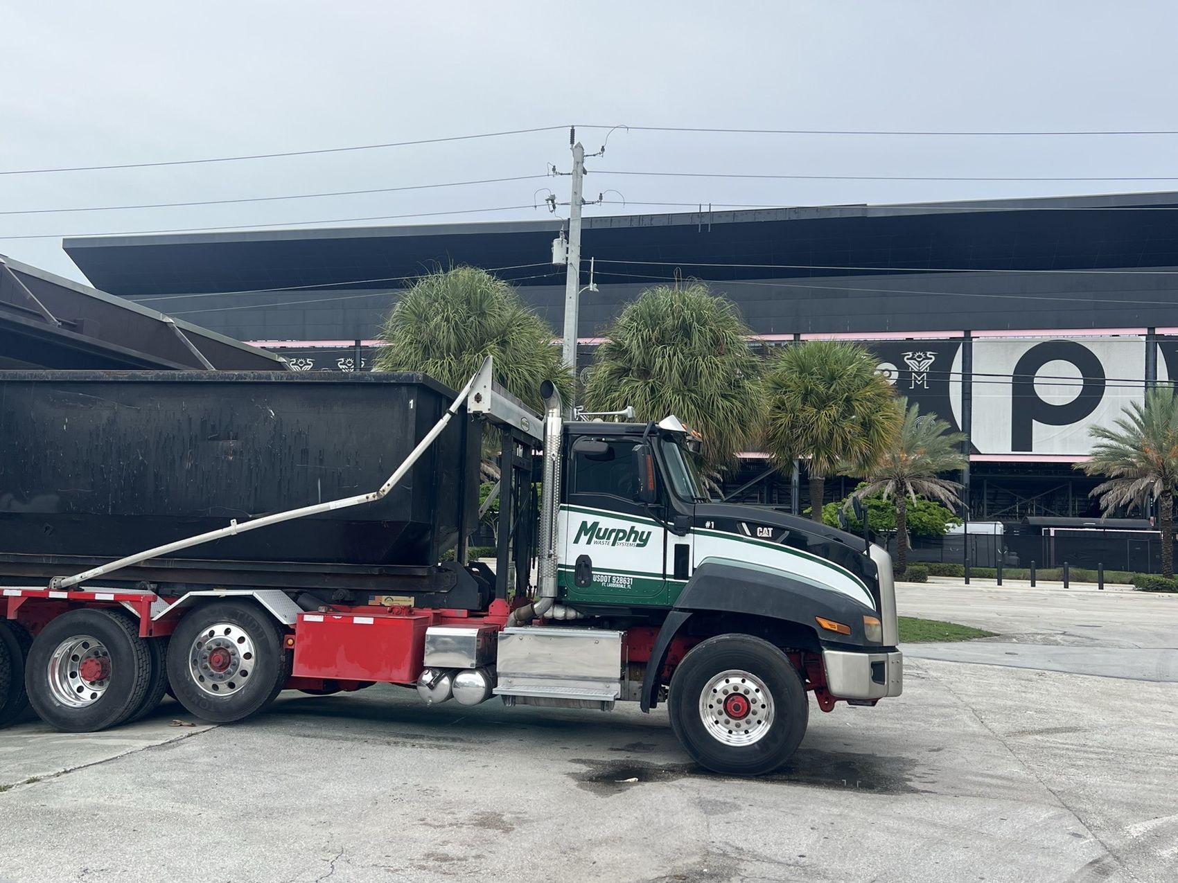 Roll-off dumpster container